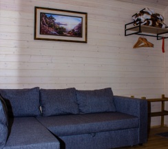 Двухместный семейный номер Classic с красивым видом из окна двуспальная кровать и диван в Wolf