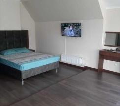Четырёхместный номер Deluxe с красивым видом из окна в Радуга