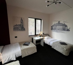 Кровать в 3-местном общем женском номере в Прусс