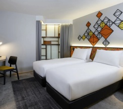 Двухместный номер Atrium View Premium 2 отдельные кровати в ibis Styles Bangkok Silom