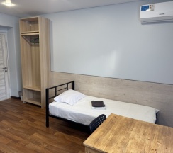 Четырехместный номер с общей ванной комнатой на мансарде №34 в Акспай