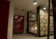 Кровать в общем 8-местном номере для мужчин и женщин в Guten Duck Moscow