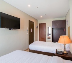 Двухместный номер Standard 2 отдельные кровати в Capital O 461 Asrodel Hotel