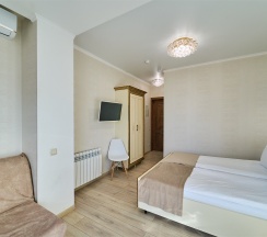 Комфорт Панорамный с балконом и видом на город,  2-х местный с дополнительным местом в Амбассадор