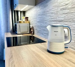 Двухместные апартаменты c 1 комнатой (двуспальная кровать) в Fresh Room на улице Маршала Устинова 3
