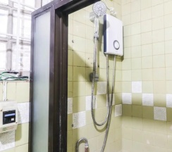 Кровать в общем номере в Kamuning Hostel