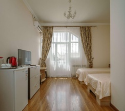 Номер стандарт с 2 односпальными кроватями в Kristi