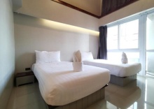 Двухместный номер Deluxe 2 отдельные кровати в RedDoorz Premium A Room Bangkok