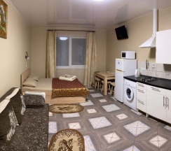 Четырёхместные апартаменты с красивым видом из окна в Дюна-центр