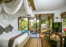 Бунгало Deluxe с видом на океан в Tolani Resort Koh Kood