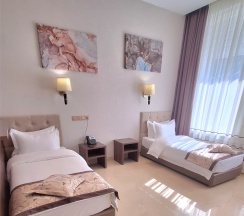 Стандартный однокомнатный номер с 2 кроватями (с возможностью размещения маломобильных граждан) в Мираж