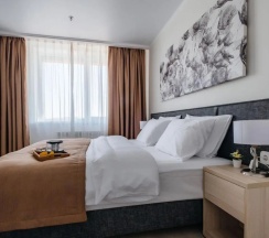Двухместный люкс Executive с видом на парк двуспальная кровать в TÖR`RE Astana by Wyndham