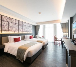 Двухместный номер Deluxe 2 отдельные кровати в Ramada Plaza by Wyndham Chao Fah