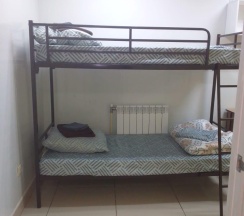 Кровать в 10-местном общем номере в Сити-В