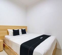 Люкс Deluxe в Capital O 93266 Palmier Hotel