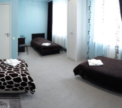 Трехместный номер с тремя одноместными кроватями в Люксембург