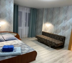 Четырёхместный номер Standard с красивым видом из окна в Дюна-центр