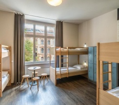 Кровать в общем номере в MEININGER Hotel Berlin Mitte