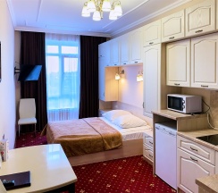 Студия с кухней и двухспальной кроватью в Calypso