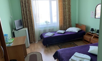 Кровать в 2-местном общем номере в Надежда