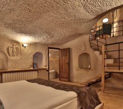 Двухместный люкс Cave Honeymoon двуспальная кровать в La Casa Cave