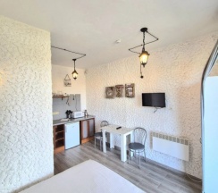 Двухместные апартаменты с красивым видом из окна двуспальная кровать в Дом на Балтийской косе