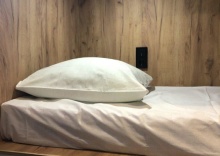 Кровать в общем номере в Sleepbox