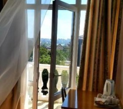 Трехместный номер стандарт с балконом в Гостевой дом