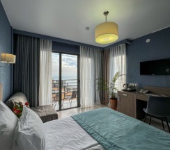 Двухместный номер Standard с балконом и с красивым видом из окна 2 отдельные кровати в Sokol