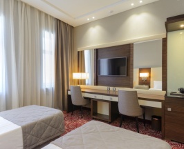 Двухместный номер Deluxe 2 отдельные кровати в Senator Hotel