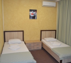 Двухместный с ванной комнатой двумя кроватями в Стандарт