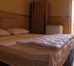 Двухместный номер Superior с балконом двуспальная кровать в Grand Guest House Kvariati