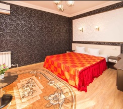 Номер люкс семейный с 1 двуспальной кроватью в Вариант