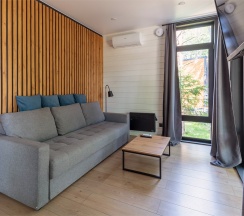 Коттедж с 1 спальней и купелью без сауны в Black Village Family