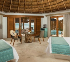 Номер Plunge Pool oceanfront в Shangri-la Caribe Beach Village Resort