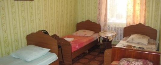 Кровать в 5-местном общем номере в Юнона