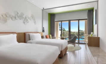 Четырёхместный номер Premium с видом на бассейн в Holiday Inn Resort Sanya Bay by IHG