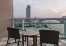 Двухместный люкс c 1 комнатой с видом на реку двуспальная кровать в Chatrium Hotel Riverside Bangkok