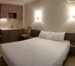 Люкс с балконом и с красивым видом из окна в Отдохни