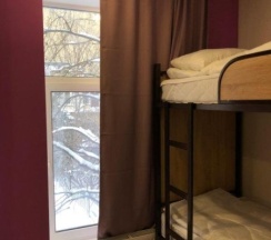 Кровать в женском двухместном смежном номере (+WC) в Танский