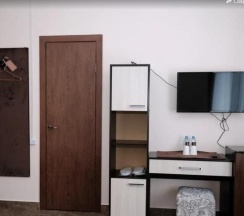 Трехместный номер с 3 односпальными кроватями в G-hotel
