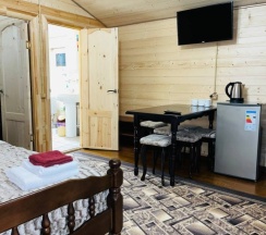 Четырёхместный коттедж с 2 комнатами с красивым видом из окна в Forest house resort