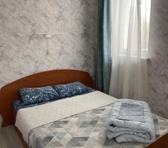 Шестиместный номер Economy с балконом и с красивым видом из окна в Дюна-центр