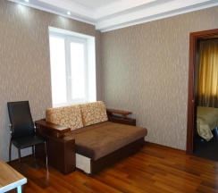 Комната люкс с 1 двуспальной кроватью и диваном в На Нагорной