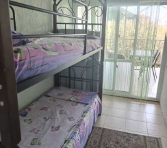 Двухместные семейные апартаменты с 2 комнатами двуспальная кровать в Уютный дворик