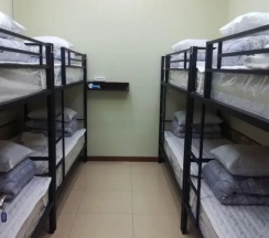 Кровать в общем номере в Shelter Hostel