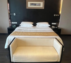 Люкс с видом на сад в Guangdong Nanmei Osotto Hotel