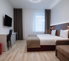 УЛУЧШЕННЫЙ с 1 или 2 кроватями и диваном в Amati Kazan