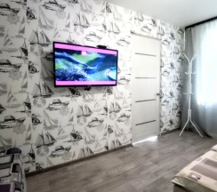 Четырёхместный номер Superior с балконом и с красивым видом из окна в Апартаменты Атмосфера Комфорта