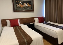 Двухместный номер Standard 2 отдельные кровати в Longzhu Guesthouse